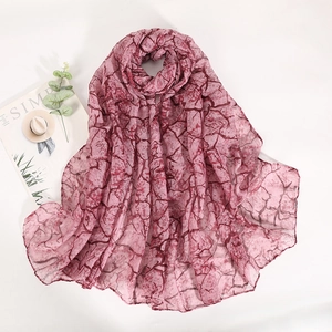 Pink scarf with red marble print made of lightweight breathable voile fabric shawl