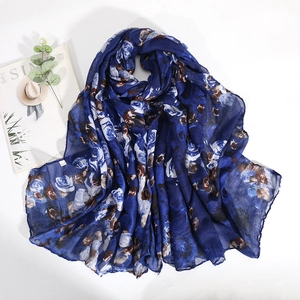 Navy blue rose print long scarf made of lightweight voile on a white background