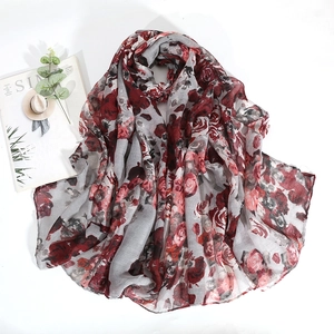 Fashionable grey scarf with red rose prints and delicate wave edges in light voile fabric