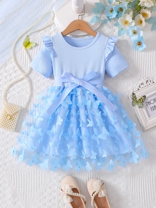 Light blue summer girl's dress with 3D floral appliques and satin bow detail