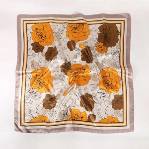 Detailed flat lay of 90cm square satin scarf featuring vintage rose and leaf patterns