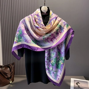 Elegant purple lilac floral satin square scarf draped gracefully on a black outfit