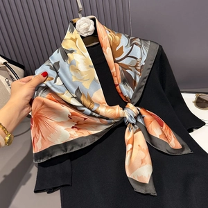 90cm silk-like floral square scarf in blue and orange for sun protection and styling
