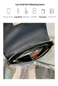 Internal storage detail of quilted crossbody bag with golden chain and zip pocket
