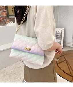 Detail view of the gradient pastel quilted shoulder bag with golden chain and metal clasp