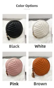 Detail of round quilted PU leather crossbody bags with tassels in four colors