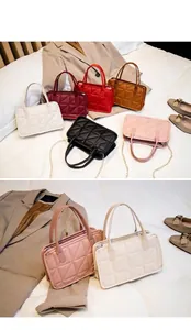 Detailed view of quilted faux leather handbags with gold chains in six elegant colors