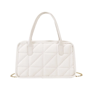 Detail of white quilted PU leather handbag with gold chain strap and top handle