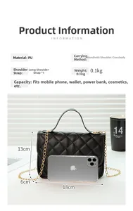 Close-up of black quilted PU leather crossbody bag with elegant gold chain strap
