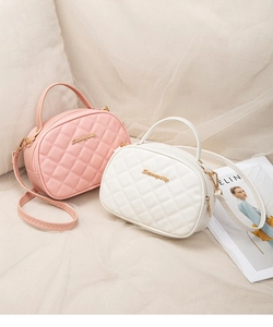 Quilted oval leather handbags in white and pink with gold hardware and logo detail