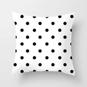 Modern minimalist decorative square pillow case with black polka dots on white fabric