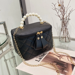 Quilted black box bag with elegant pearl handle and gold chain strap for women