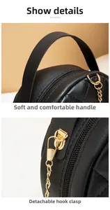 Macro detail of quilted leather handbag with gold chain zipper and detachable metal hook