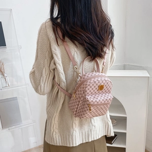 Pink mini floral printed backpack for women with gold metal zipper and leather straps