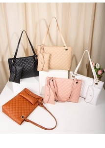 Detailed set of five quilted tote bags in black beige white pink and brown colors