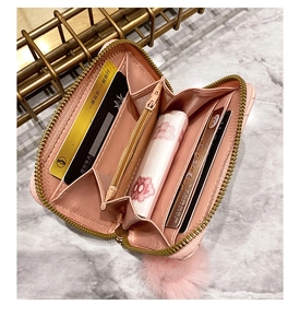 Pink PU leather wallet interior showing multiple card slots and accordion compartments