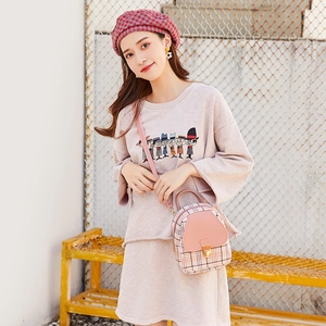 Pink checkered crossbody backpack for women with gold metal lock and leather flap