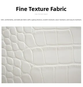 Close-up of white crocodile pattern faux leather texture with soft glossy finish