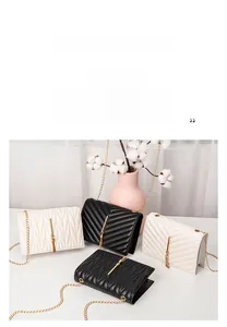 Close-up of quilted chain crossbody bags featuring elegant tassels and gold hardware
