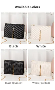 Detail view of black and white crossbody bags with tassel and gold chain straps