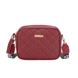 Burgundy quilted crossbody camera bag with leather tassel and lettered strap