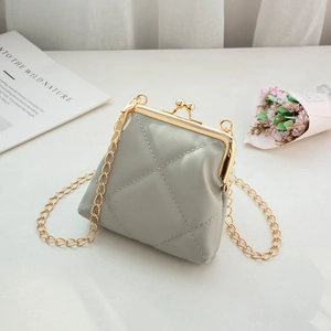 Light grey quilted mini crossbody bag with gold metal frame and chain strap