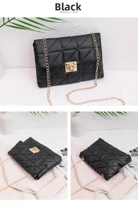 Close-up of black quilted chain bag featuring geometric patterns and a gold square lock
