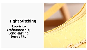 Close-up of precise stitching and gold Success logo on yellow crocodile pattern bag