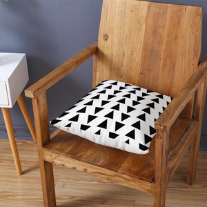 Modern black and white geometric triangle pattern polyester pillow cover on wooden chair