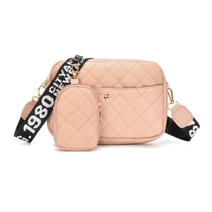 Pink quilted crossbody bag set with patterned canvas strap and matching coin purse