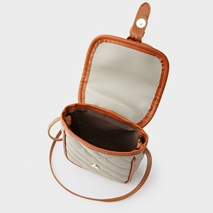 Quilted olive green phone bag with brown trim and magnetic flap for daily use