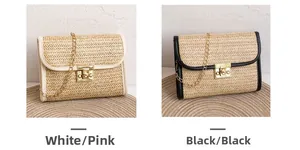 Detail of woven straw envelope bags with metal locks and golden chain straps