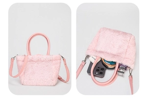 Pink faux fur mini bag interior view showing storage capacity for phone and makeup