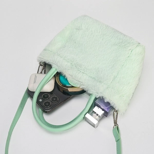 Light green faux fur quilted handbag with detachable strap and daily essentials inside