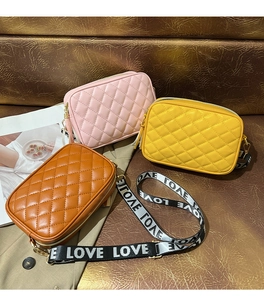 Detailed quilted texture of compact crossbody bags in pink, yellow and brown colors