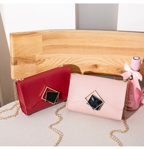 Chic burgundy and pink leather crossbody bags with golden chain straps and square locks