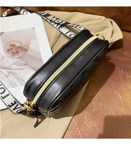 Detail of black quilted leather camera bag with stylish LOVE letter print wide strap
