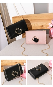 Detail of elegant black and pink mini chain bags with vintage double diamond metal locks