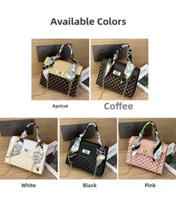 Detail of elegant crossbody bag with silk scarf handle and metal twist lock in five colors