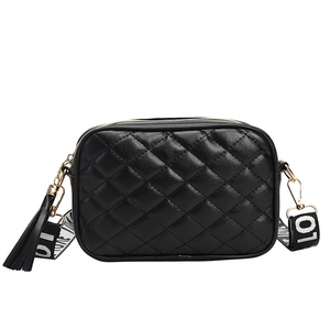 Black quilted crossbody camera bag with tassel detail and wide LOVE printed strap