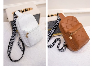Detail of quilted leather crossbody bags in white and brown with letter print straps