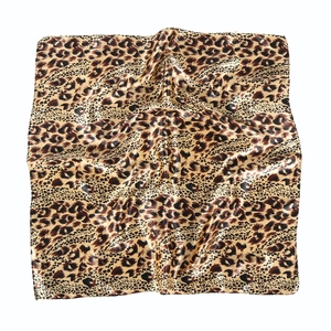 Classic leopard print satin square scarf with a smooth finish and silky texture