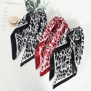 Three-piece leopard print satin silk scarves set in black, white, and red animal patterns