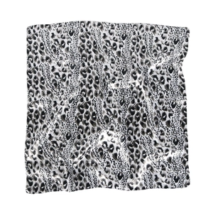 Classic black and grey leopard print silk scarf with a smooth and glossy texture