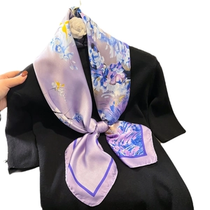 Elegant purple floral silk scarf 90x90cm with artistic blossom print on black sweater