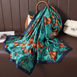 Elegant lake green silk scarf with orange ginkgo leaf print and blue wide border