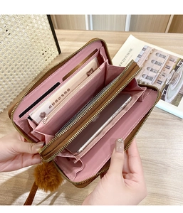 Detailed interior of a brown PU leather long wallet with multi-card slots and phone pouch