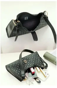 Detail view of stylish patterned underarm bag showing interior capacity with daily essentials