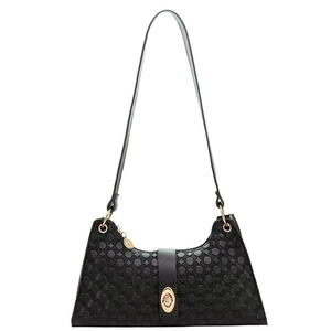 Classic black underarm bag with geometric texture and gold hardware on white background