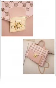 Detail view of pink printed handbag with metal push lock and chain shoulder strap